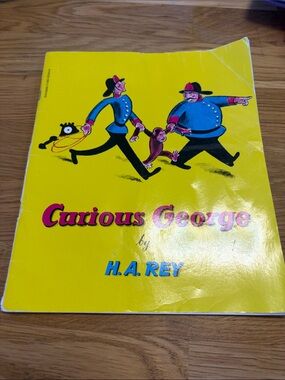 Curious George by H.A. Rey - Bright Yellow Illustrated Children's Book